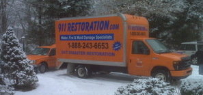 Water Damage Restoration Truck At Winter Job Location